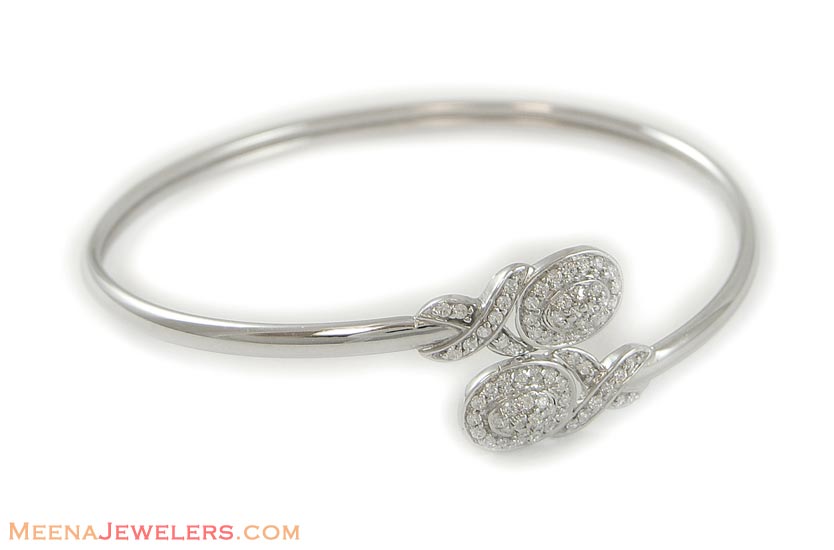 crafted 18k white gold bangle studded with star sgnity stone. Bangle ...