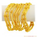 22k gold bangles Wavy design (set of 6) - Click here to buy online - 6,566 only..